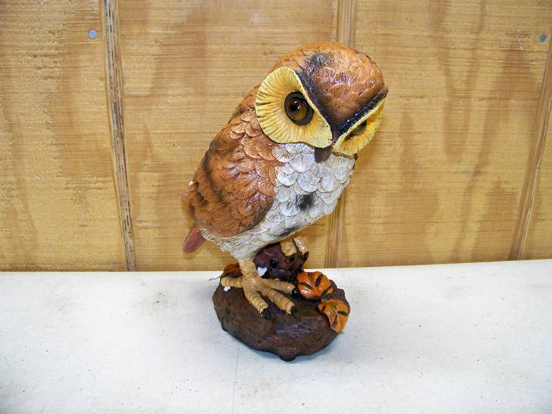 lot 714 image: Motion Activated Hooting Owl