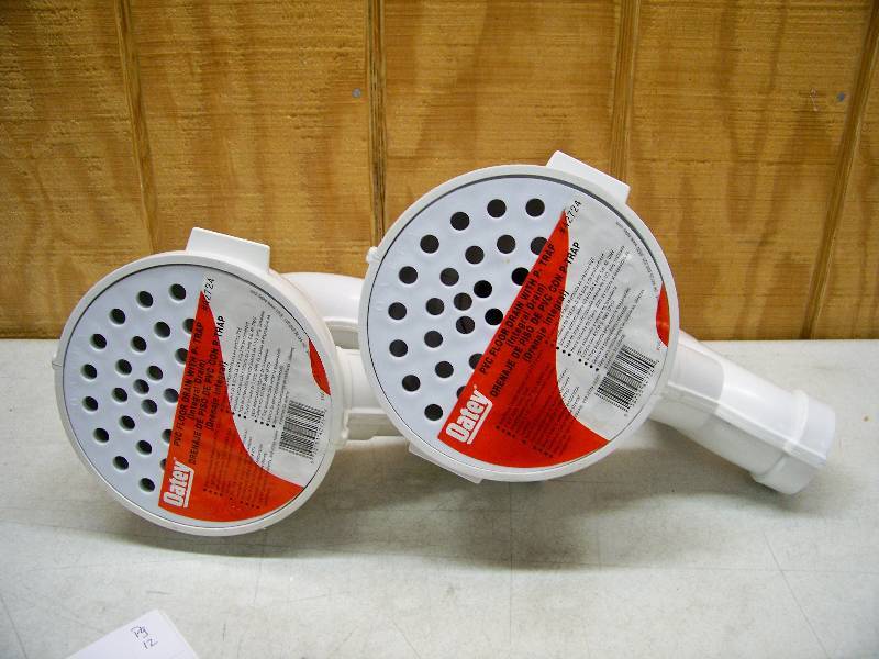 lot 834 image: 2 Oatey PVC Floor Drains with P-Trap