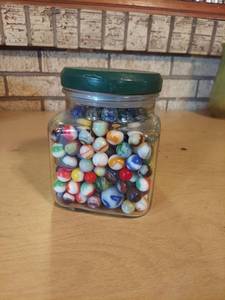lot 5640 image: jar with marbles