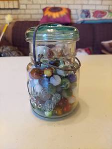 lot 5657 image: jar with marbles