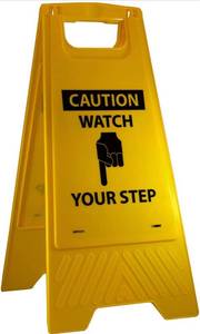 lot 15616 image: CAUTION-WATCH YOUR STEP Sign with Graphic - 10.75 in. x 24.63 in. Heavy-Duty Plastic, Double-Sided Floor Sign with Black on Yellow
