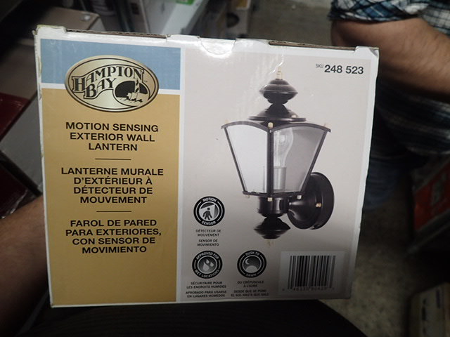 lot 3113 image: Hampton Bay Black Motion-Sensing Outdoor Wall Lantern 248523