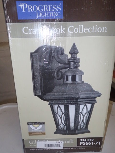 lot 3145 image: Cranbrook Collection 1-Light Outdoor Gilded Iron Motion Sensor Wall Lantern