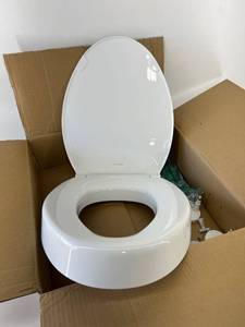 lot 44000 image: Koehler Elongated Raised Toilet Seat
