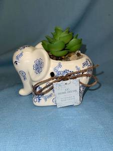lot 33056 image: Elephant scented planter with faux cactus