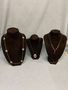 lot 33073 image: Three fashion necklaces