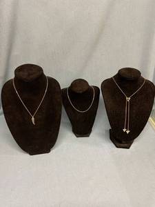 lot 33074 image: Three fashion necklaces