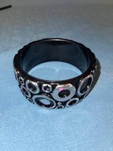 lot 33090 image: Two plastic bracelets