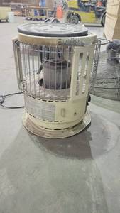 lot 7334 image: Aladino Equator Round Kerosene Heater Model C581U