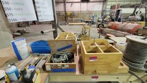 lot 15156 image: Contents of Table - Hardware, OMNI Cable, Bondo Body Filler, and More