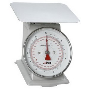 lot 987 image: Winco SCAL-62 Two Pound Receiving Scale 6.5 Dial 1-1 Each