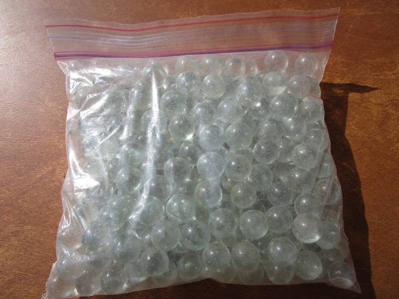 lot 172 image: Bag of Antique Clear Marbles