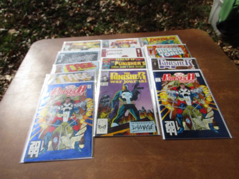 lot 21 image: Lot of Marvel Comics - Wolverine, Luke Cage, Punisher