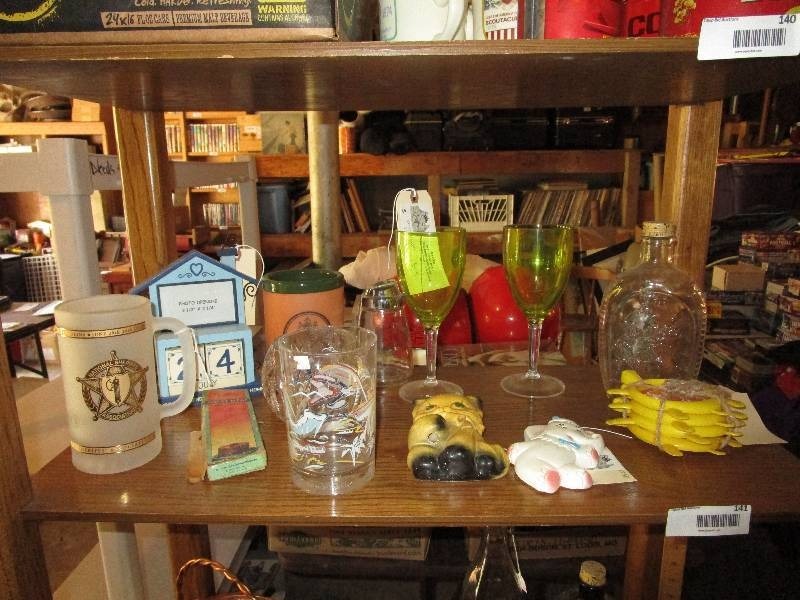 lot 141 image: Shelf Full of Random Goodies