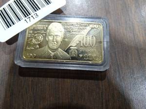 lot 1713 image: Small Trump $100 Gold Plated Solid Bar (2020)
