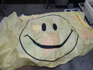 lot 1797 image: Used Happy Face Yellow and Black 3Ft x 5Ft Flag