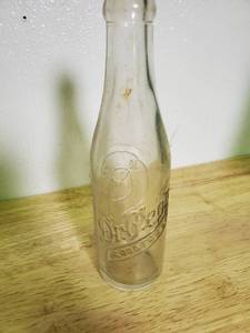 lot 1057 image: Embossed Dr Pepper Bottle 1024 Good for life