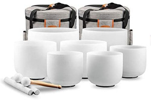 lot 62606 image: Ryan Dvan 7-12 Inch Set of 7 Forested Quartz Crystal Singing Bowl Chakra Set with Free 2 pcs Carrying Case   (Retails $570.00)  (Condition Unknown)  (SOLD AS IS)