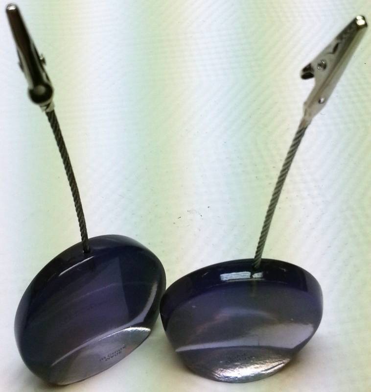 lot 9299 image: Pair of flexible Roach Clip business card holders 2 X 1 thick with heavy Purple Acrylic base.
