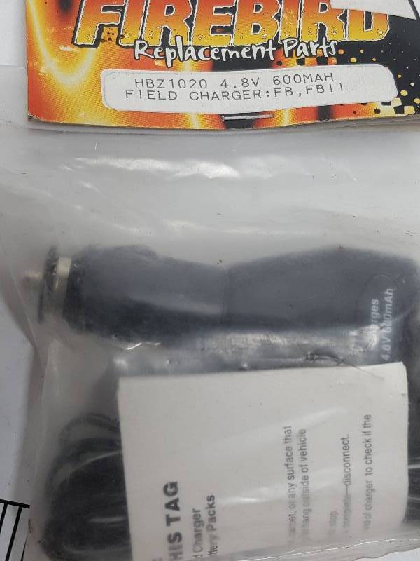 lot 8545 image: New in the package is this Firebird Filed charger for RC cars and planes