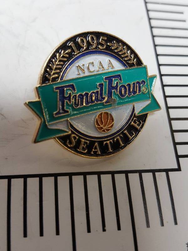 lot 8733 image: Another one of those collectable hat or lapel pins most are finished with wild porcelain colors.