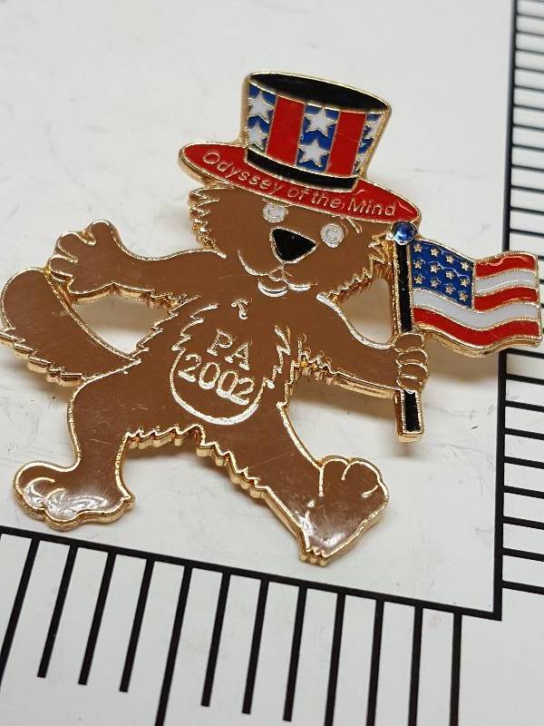 lot 8743 image: Another one of those collectable hat or lapel pins most are finished with wild porcelain colors.