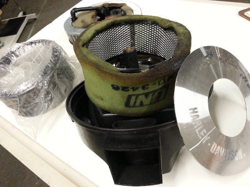 lot 9304 image: Box of left over Harley Davidson motorcycle air cleaner and miscellaneous pieces