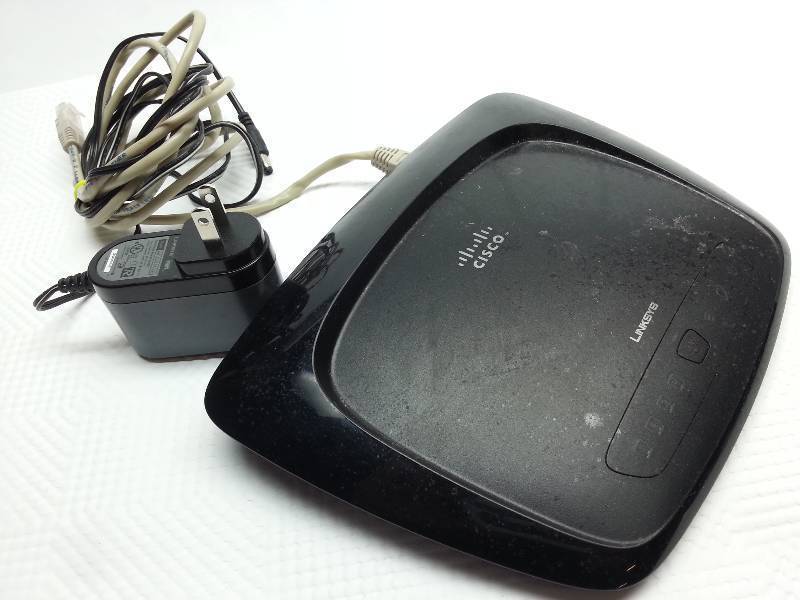 lot 9322 image: Just replaced by Time Warner by their hot dog router was this Linksys by Cisco wireless internet router.