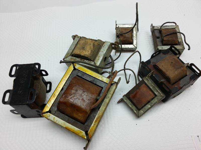 lot 9331 image: Misc electric coils from a tinkerers garage work shop.  If he could use it again or thought he was , he would save it.