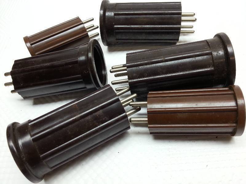 lot 9333 image: Misc tube cover containers from a tinkerers garage work shop.