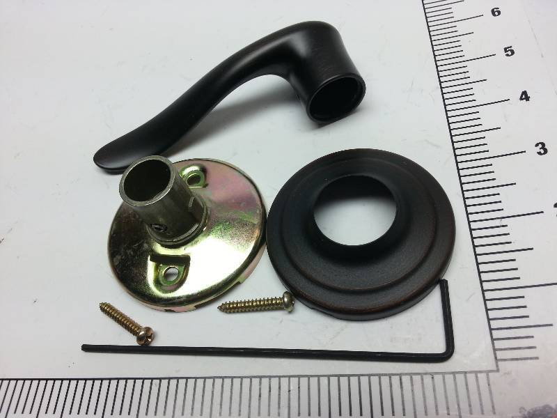 lot 9349 image: New Kwikset 97880-754 Dummy Leverset Tustin LH Venetian Bronze handle with hardware shown.
