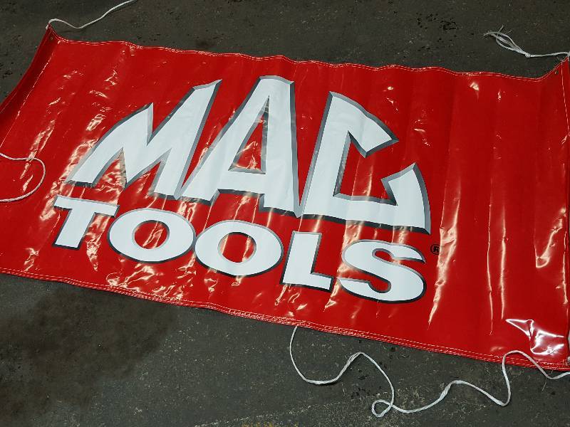 lot 8503 image: Cool looking plastic Mac Tools racing contingent sponsors 36 X 72 banner.