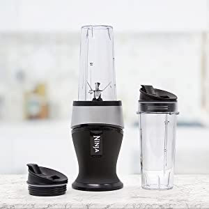 lot 24712 image: Ninja QB3001SS Fit Compact Personal Blender, Pulse Technology, 700-Watts, for Smoothies, Frozen Blending, Ice Crushing, Nutrient Extraction,Food Prep & More, (2) 16-oz. To-Go Cups & Spout Lids, Black Retail $59.99