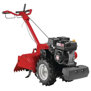 lot 6 image: Troy-Bilt Mustang 18 208cc Gas OHV Engine Rear Tine Garden Tiller with Forward and Counter Rotating Tilling Options -Retail $1,099.00