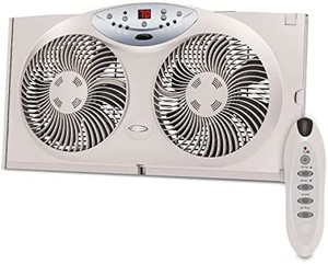 lot 63748 image: Bionaire Window Fan with Twin 8.5-Inch Reversible Airflow Blades and Remote Control, White