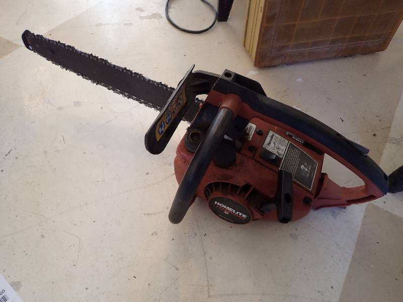lot 2843 image: Homelite Gas Powered 14 Chain Saw