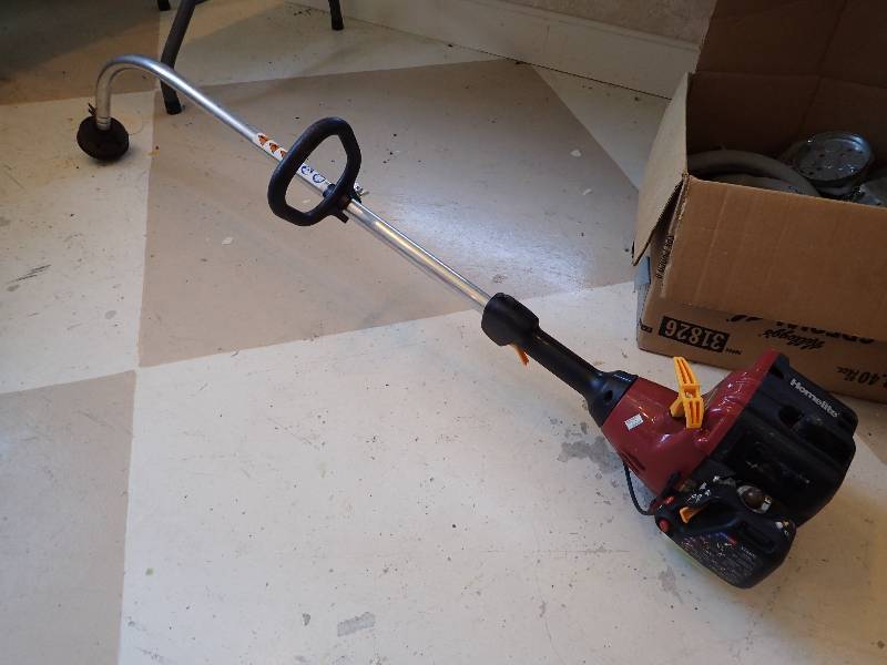 lot 2855 image: Homelite Gas Powered Duel String Weed Eater