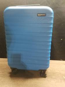 lot 9567 image: Amazon Basics 21-Inch Hardside Spinner