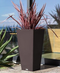 lot 36 image: Outdoor Tall Planter, black. Doubles as stool.