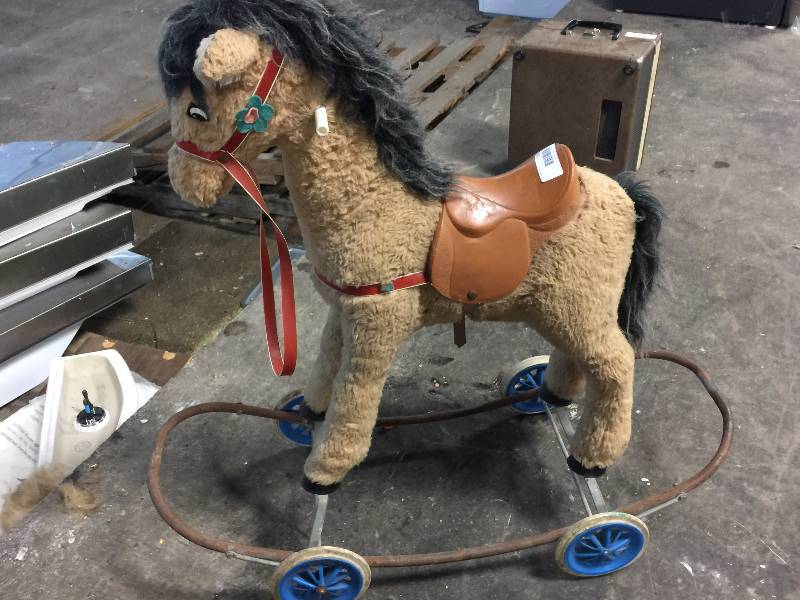 lot 1434 image: ANTIQUE STROLLER HORSE