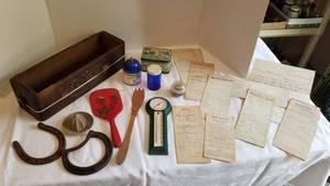 lot 1021 image: Antique warranty deeds, Razobrite razor bath, Ronnefeldts tee tin, wood box 4 x 14 x 5, horse shoes, juicer and more