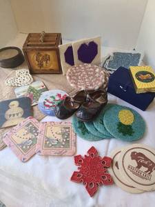 lot 1046 image: Old baby shoes, coasters, dog cards