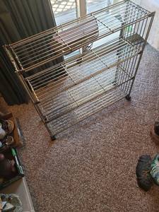 lot 1054 image: Metal shelving with light attached, 31x31x9