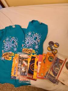 lot 1112 image: Wichita River Festival T-shirts, guides, buttons