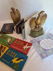 lot 1228 image: Pair of Sexton metal eagle bookends and books