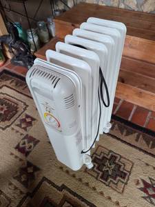 lot 1315 image: Lakewood electric heater on rollers