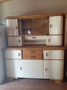 lot 1318 image: Vintage German Kitchen Hoosier cabinet with Gerrix glass scoops. (3) larger size and (2) smaller scoops. 68 x 63 x 23. Matches lots # 1317 and 1319