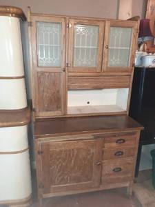 lot 1324 image: Antique wooden kitchen cupboard. Three drawers, top pulls out for more work space, and top has lots of storage. 69 x 38.5 x 24 .5