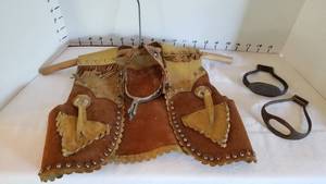 lot 1355 image: Boys leather vest, spurs and 2 metal stirrups