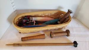 lot 1360 image: Wooden thread spools and basket